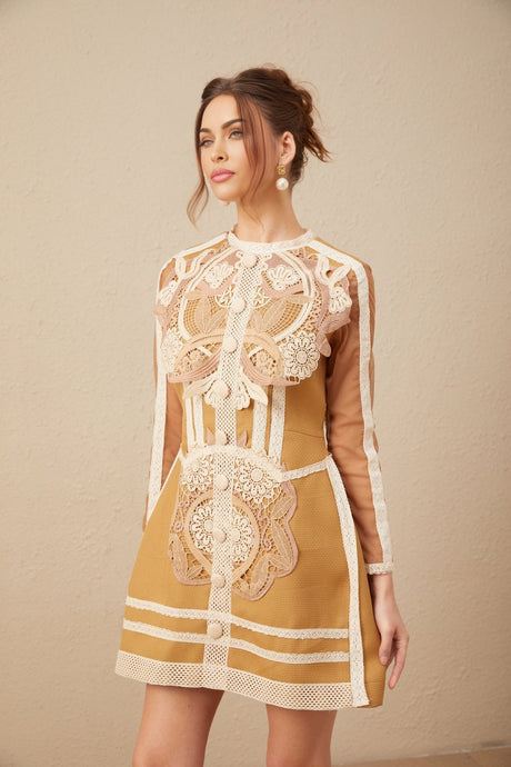 A short white lace dress with a peplum waist and cutout details featuring a fitted bodice and flared skirt