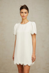 A short white mini dress adorned with sparkling crystal embellishments named Berenice