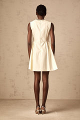 A short white mini dress with a bowknot embellishment named Isabelle
