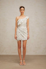 A short white mini dress with a pattern print and ruffled details named Irina