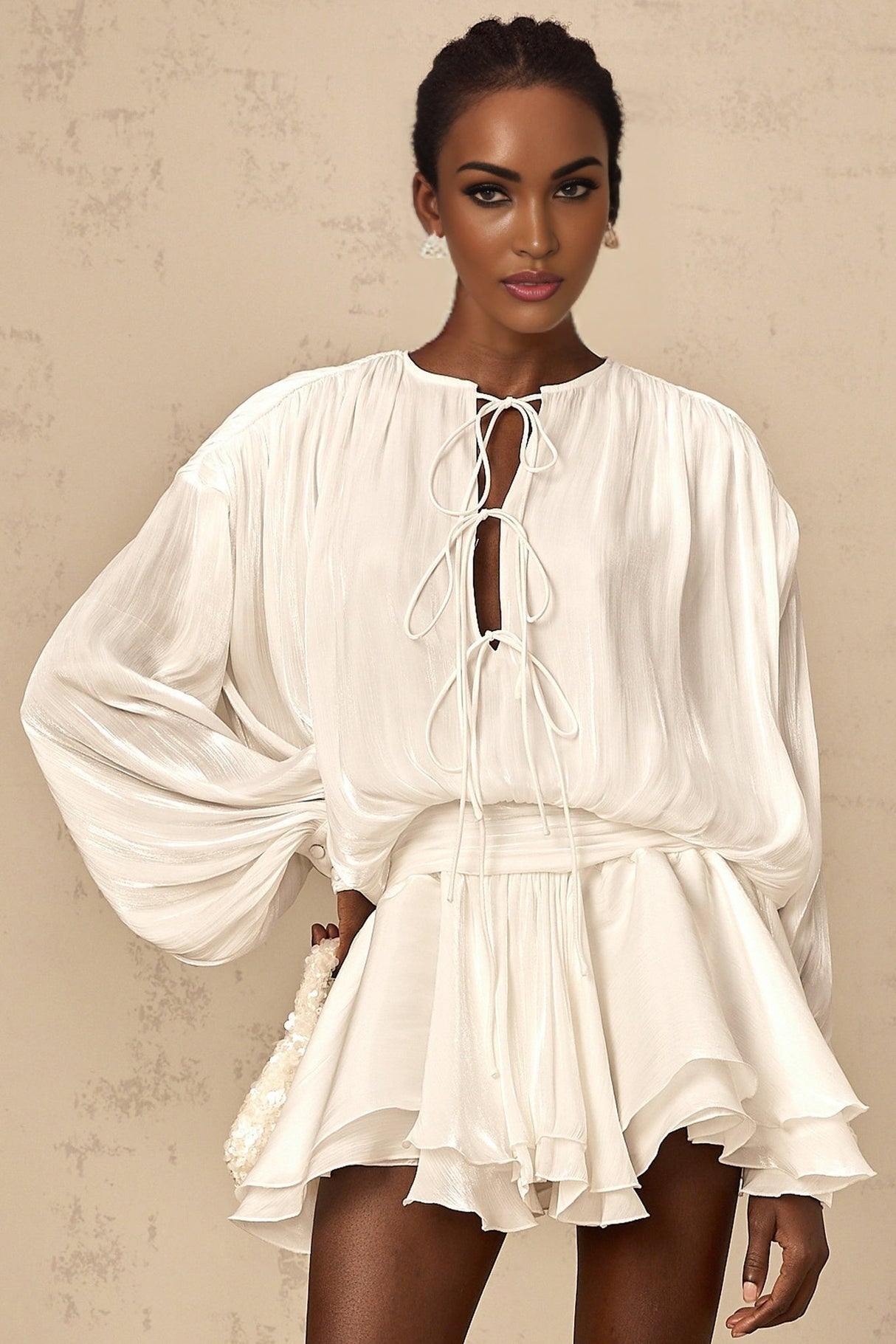 A short white mini dress with pleated fabric and glitter effect named Mahault
