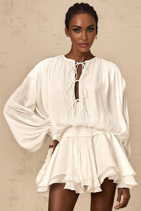 A short white mini dress with pleated fabric and glitter effect named Mahault