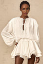 A short white mini dress with pleated fabric and glitter effect named Mahault
