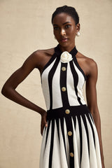 A sleeveless knitted mini dress with contrasting colors named Celeste