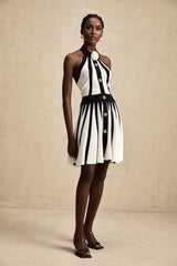 A sleeveless knitted mini dress with contrasting colors named Celeste