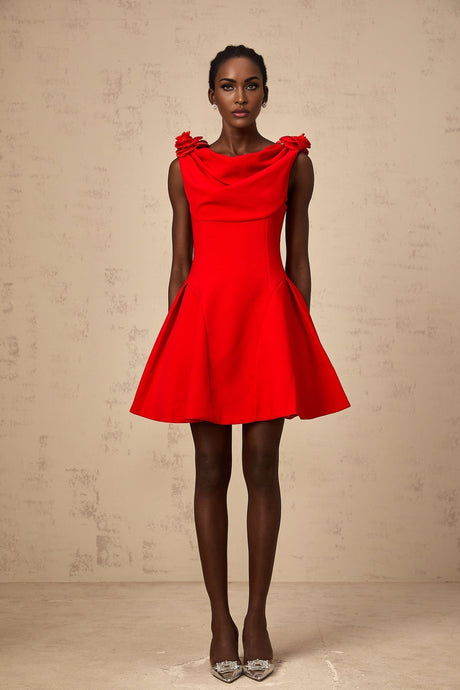 A sleeveless red mini dress with faux flower details on a mannequin or model against a plain background