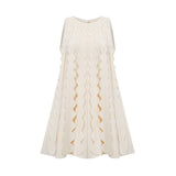 A sleeveless white mini dress with wavy details and a fitted silhouette named Axelle