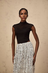 A twopiece matching set featuring a corsetstyle top and skirt in contrasting colors called Virginie The top has a fitted bodice design while the skirt complements the look in a coordinating shade
