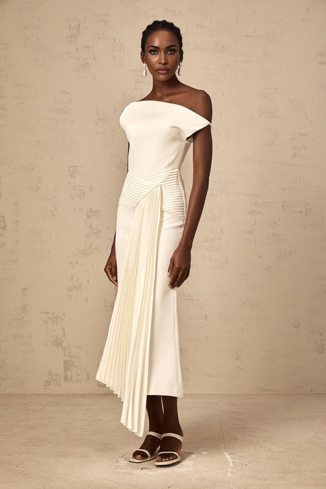 A white asymmetric draped midi dress with the name Laurine on a mannequin or model showing the draping and length of the garment