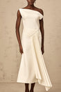 A white asymmetric midi dress with draped fabric details worn by a model standing against a plain background