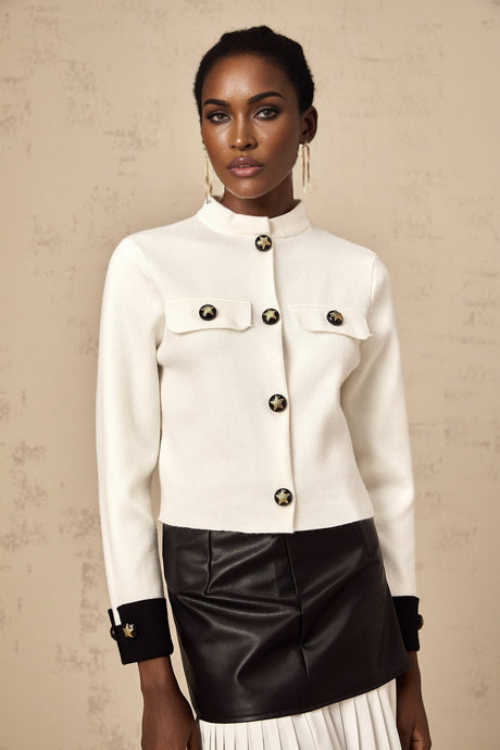 A white knitted jacket with contrast color details named Cyrielle