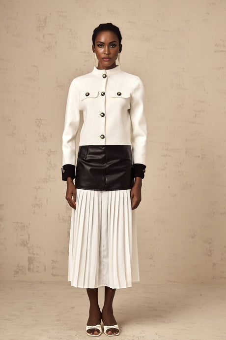 A white knitted jacket with contrasting color accents named Cyrielle