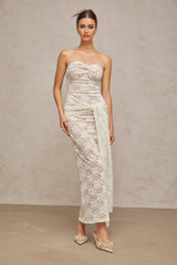 A white lace midi dress with draped details and feminine design named Wilhelmine