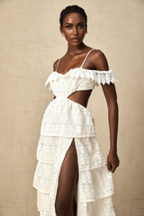 A white lace midi dress with openwork detailing named Genevieve featuring a feminine and elegant design