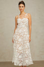 A white lace midi dress with tulle panels named Carole featuring a delicate and feminine design