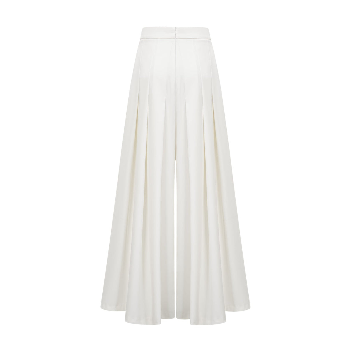 A white matching set featuring a creased top and trousers worn by a model standing against a plain background