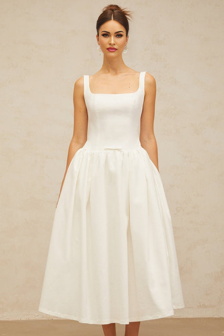 A white midi dress with a bowknot detail and flounced design named Perrine