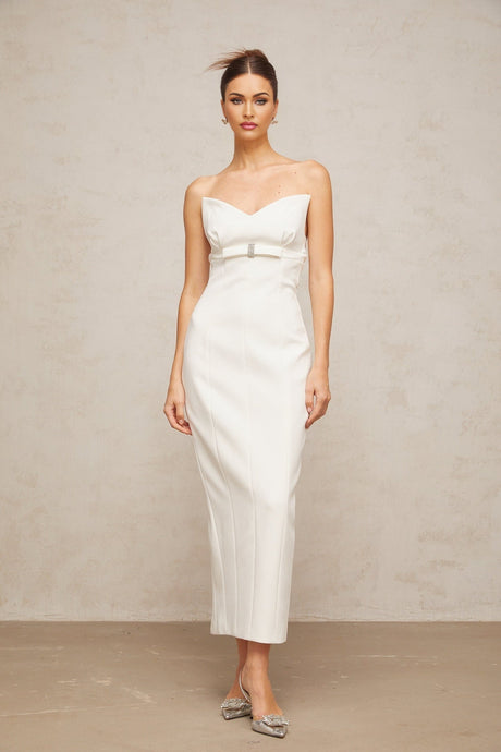 A white midi dress with corsetstyle bodice and bow detail named Isaline