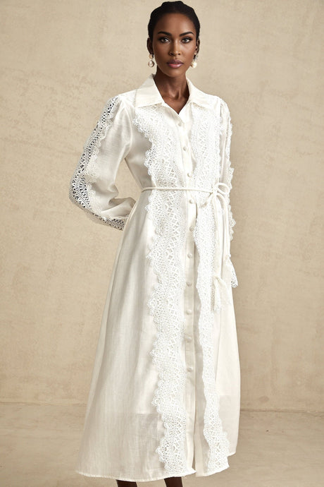 A white midi dress with lace detailing and a tied waist named Colette