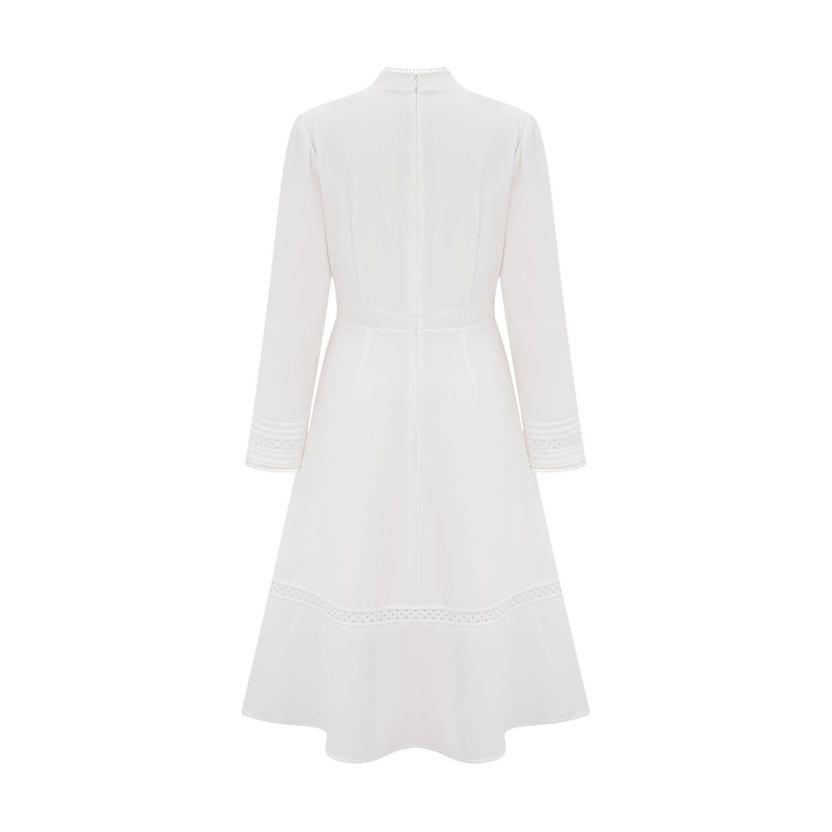 A white midi dress with panelled design and embroidery details named Madeleine featuring a feminine silhouette and delicate stitching throughout