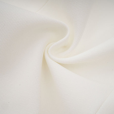 A white mini dress with a bubble skirt and fitted bodice named Elodie