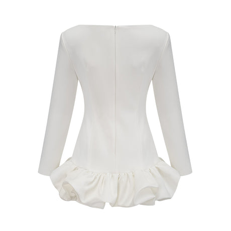A white mini dress with a bubble skirt featuring a fitted bodice and short puffed sleeves