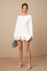 A white mini dress with a bubble skirt featuring a fitted bodice and short sleeves named Elodie
