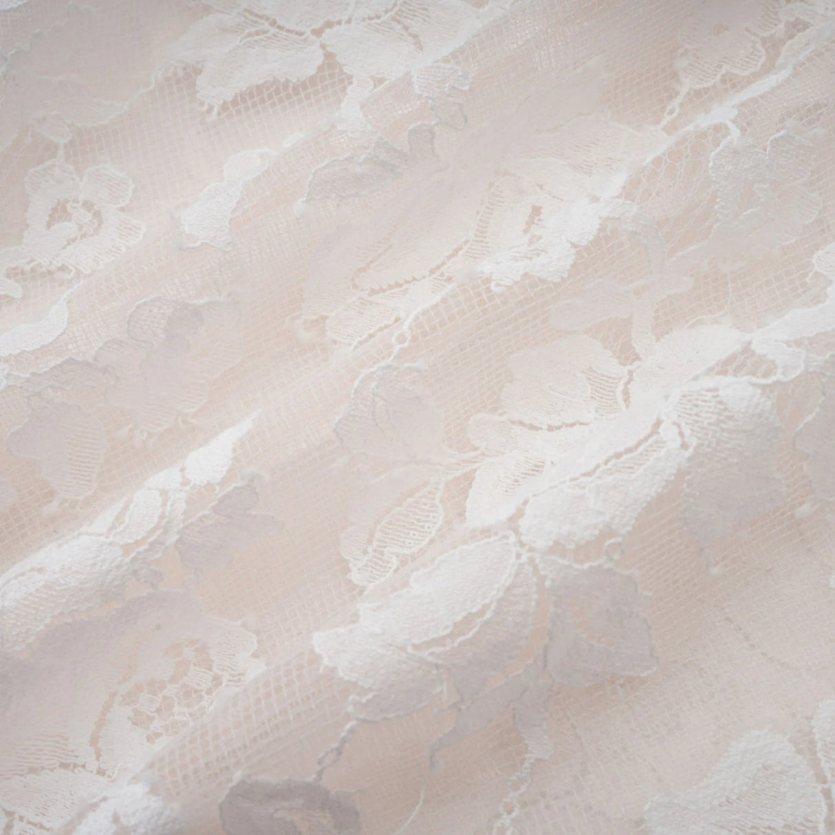 A white mini dress with floral lace detailing and a corsetstyle bodice featuring the Vivienne design