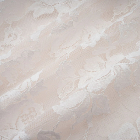A white mini dress with floral lace detailing and a corsetstyle bodice featuring the Vivienne design