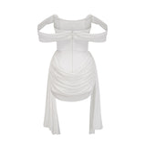 A white mini dress with ruched fabric and ribbon design details featuring a short hemline and a fitted silhouette