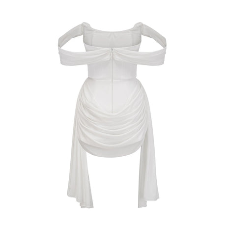 A white mini dress with ruched fabric and ribbon design details featuring a short hemline and a fitted silhouette