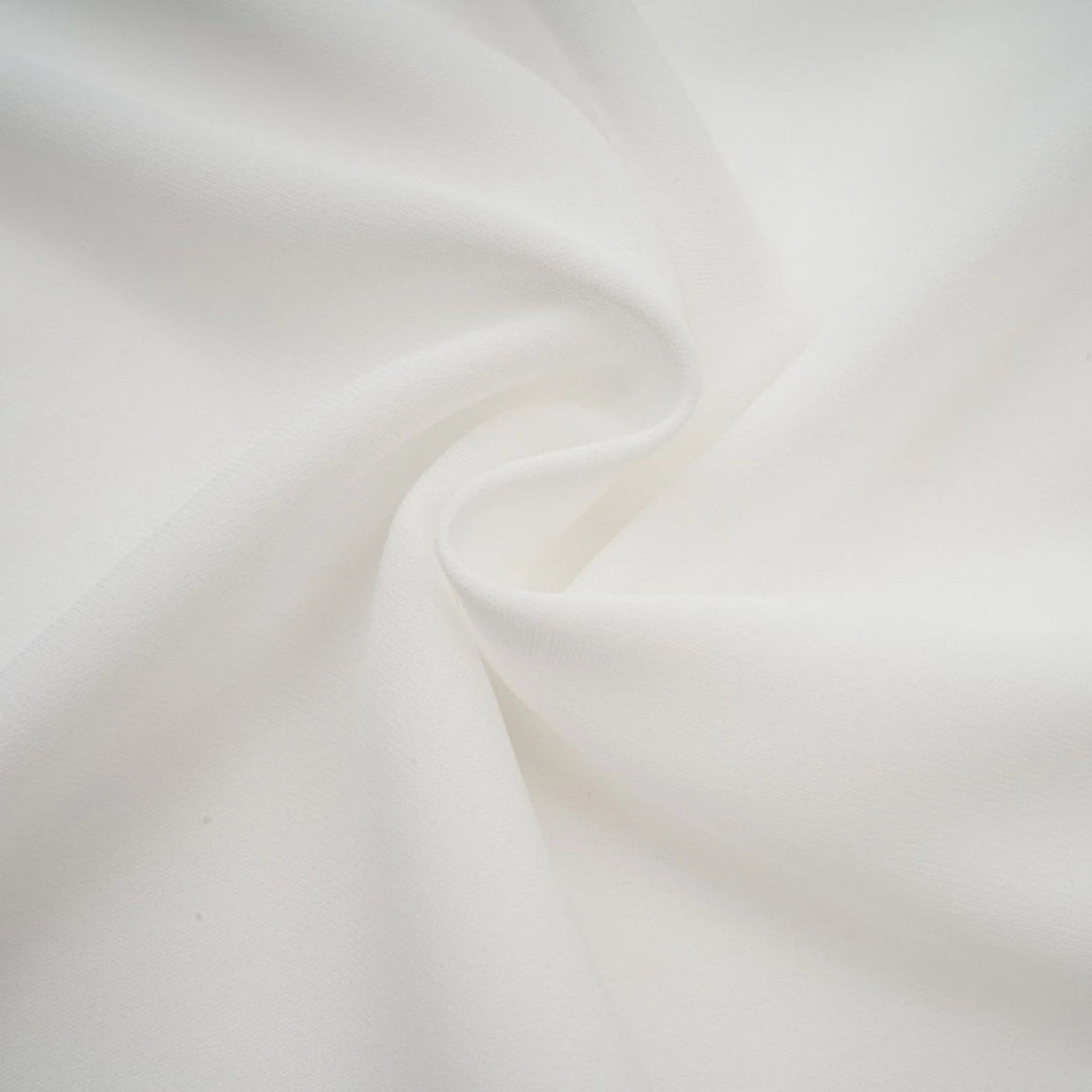 A white mini dress with ruched fabric and ribbon design details featuring a short length and fitted silhouette