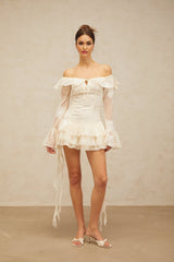 A white offshoulder mini dress with embroidery details named Desiree