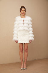 A white padded fur jacket adorned with crystal embellishments in a Margherita floral pattern