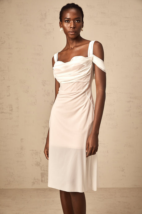 A white semi sheer midi dress with ruched detailing named Gloria