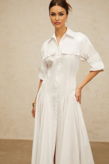 A white shirt dress with a front slit and shirred detailing named Dulcie