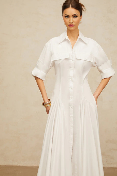 A white shirt dress with a front slit and shirred detailing named Dulcie