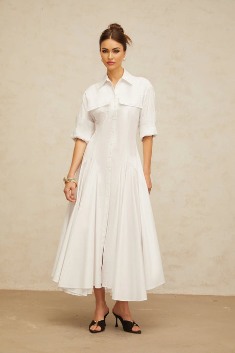 A white shirt dress with a front slit and shirred detailing named Dulcie