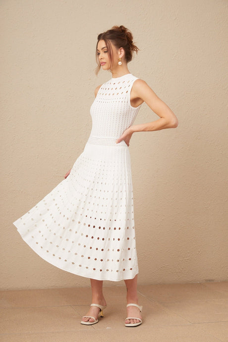A white sleeveless knitted midi dress with cut out details named Charlotte