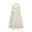 A white sleeveless midi dress with floral applique details named Émilie