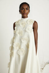 A white sleeveless midi dress with floral appliques called Emilie