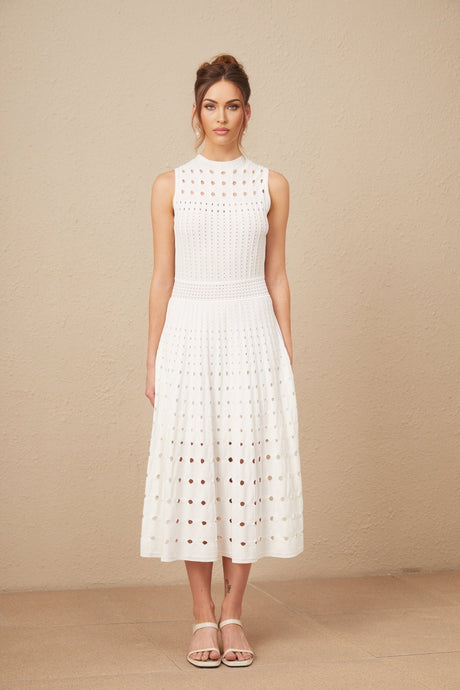 A white sleeveless midi dress with knitted fabric and cutout details