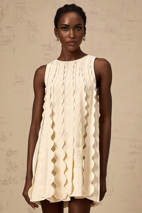 A white sleeveless mini dress with wavy details named Axelle