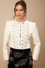 A white tweed jacket adorned with crystal embellishments named Nerina