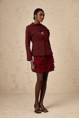 A winecolored jacket with shawllike detailing named Coralie