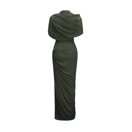 A woman wearing a long green asymmetric pleated maxi dress with a flowy skirt and one shoulder design