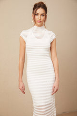 A woman wearing a midi length dress with horizontal stripes made of tulle fabric The dress has a fitted bodice and flowy skirt creating an elegant silhouette