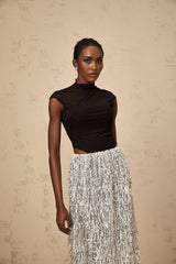 A womans matching set featuring a twotone corset style top and skirt in the Virginie design with contrasting colors