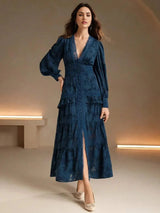 This stunning deep teal dress features a flattering A-line silhouette with romantic puffed sleeves and intricate lace.