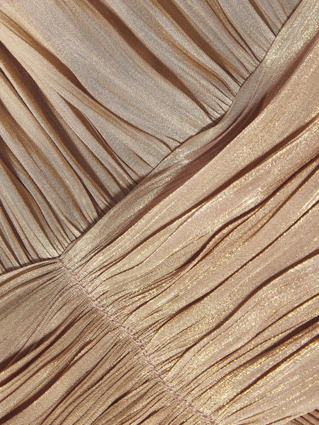 This stunning golden-brown dress features a flattering fit with elegant pleats that create a graceful drape, perfect for any.